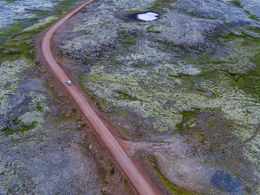 Top view of car on gravel road, Iceland #1 Photograph by Arctic-Images