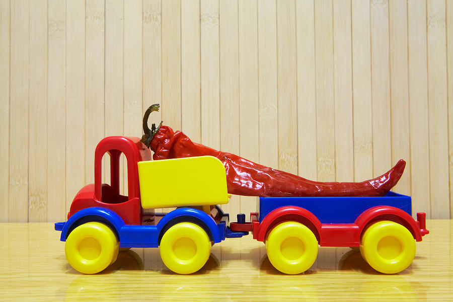 Toy plastic car with red pepper #1 Photograph by Ukrainec