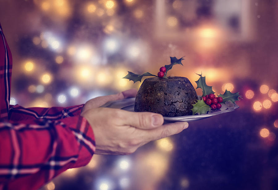 Traditional Christmas Pudding Served on a Plate #1 Photograph by GMVozd