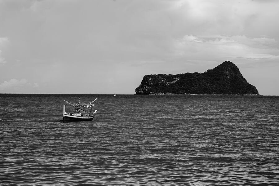 Traditional Fishing Boat Laying Alone On The Sea #1 Photograph by IttoIlmatar