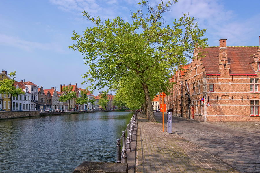Traditional red brick house and canal in Bruges, Belgium #1 Photograph by Elenarts - Elena Duvernay photo