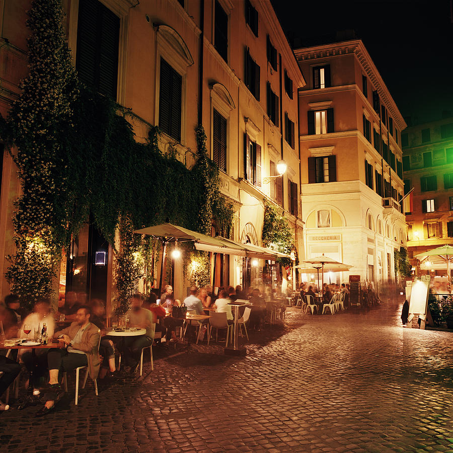 Trastevere district in Rome at night #1 Photograph by Gary Yeowell