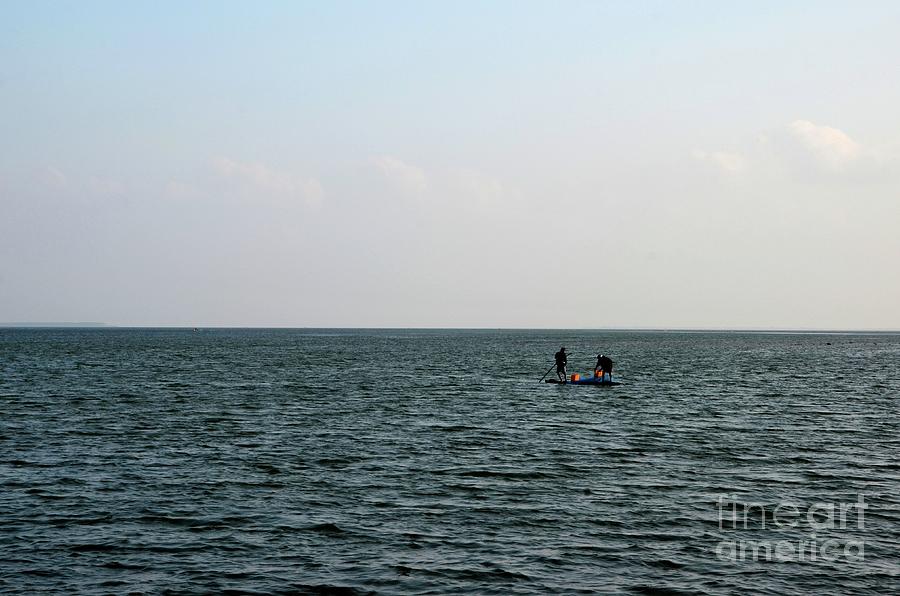 Two Sri Lankan Tamil fisherman on traditional raft at sea fishing Jaffna Sri Lanka #3 Photograph by Imran Ahmed