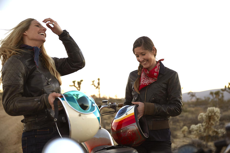 Two young women on an adventure with motorcycles #1 Photograph by Brook Pifer