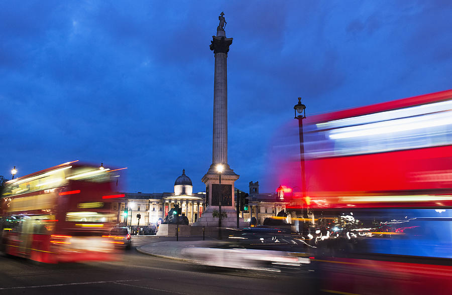 UK, England, London, Traffic at Trafalgar Square #1 Photograph by Tetra Images