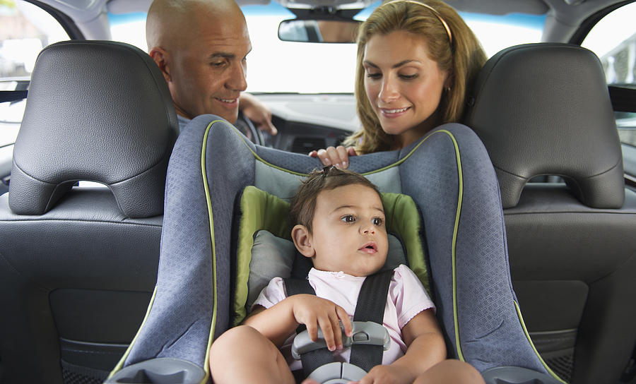 USA, New Jersey, Jersey City, Young family with small girl (12-18 months) sitting in car #1 Photograph by Tetra Images