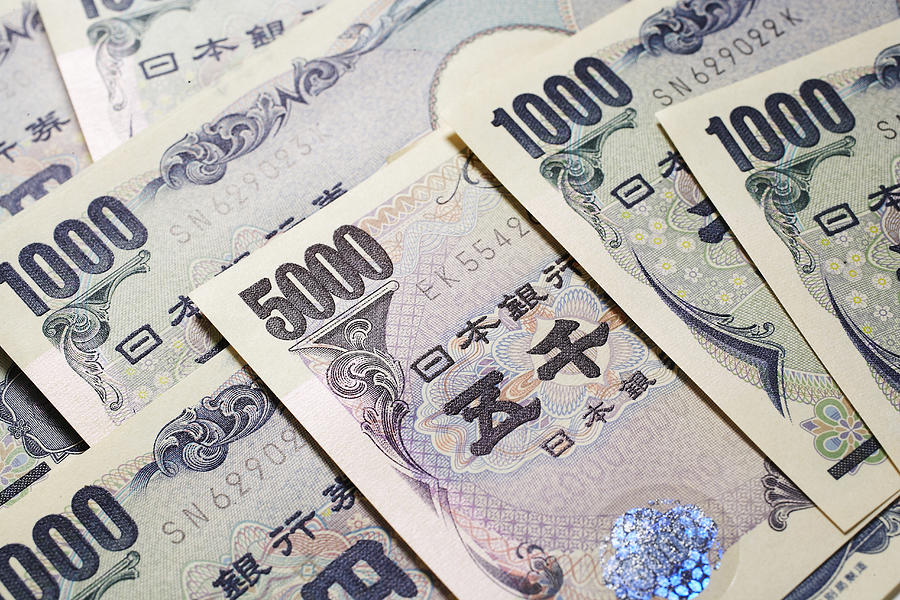 Variations of Japanese Yen Currency #1 Photograph by Thomas Northcut