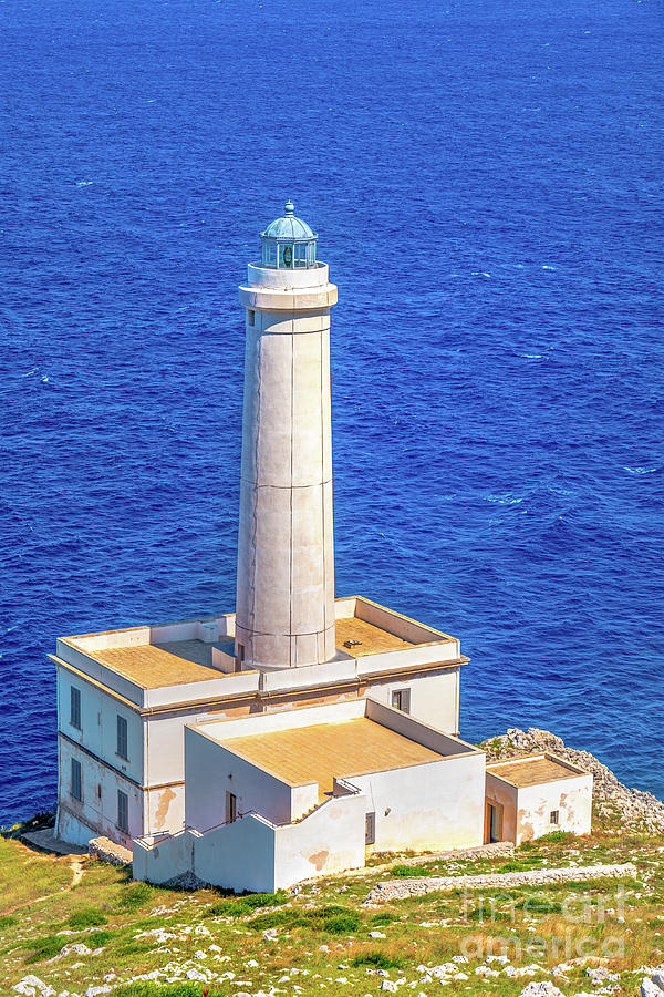 vertical background of lighthouse overlooking the sea in Italy #1 Photograph by Luca Lorenzelli