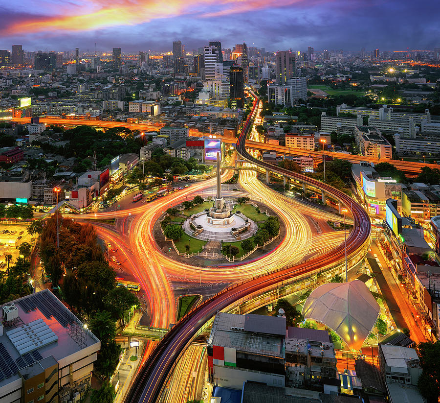 Victory monument Thailand in Bangkok city with sunset and buildi #1 Photograph by Anek Suwannaphoom