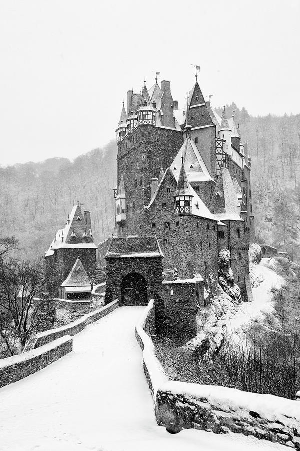 View of Burg Eltz castle in winter snow in Germany #1 Photograph by ...