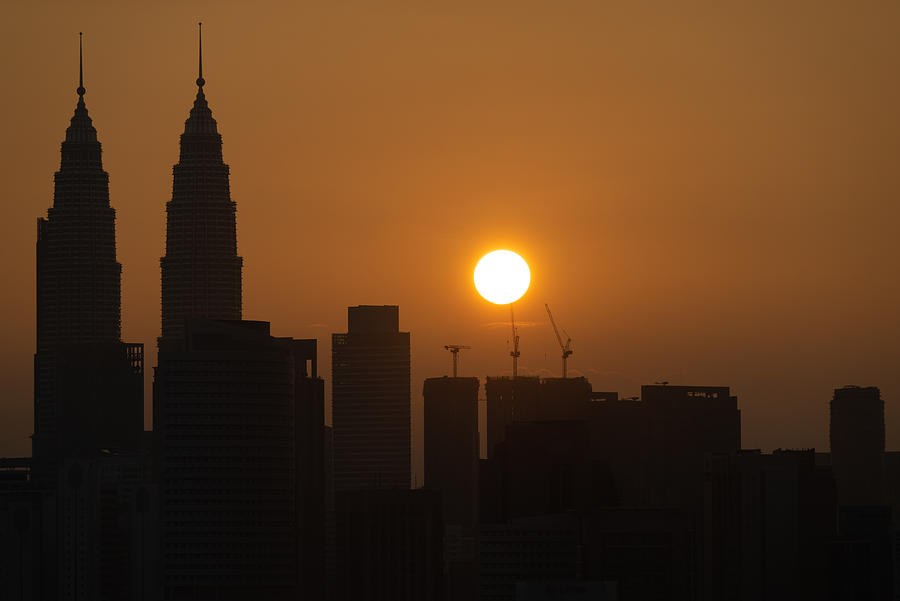 View of majestic sunrise over downtown Kuala Lumpur, Malaysia #1 Photograph by Shaifulzamri