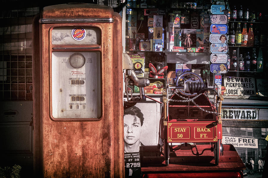 Vintage Gas Pump And Memorabilia #1 Photograph by James Eddy