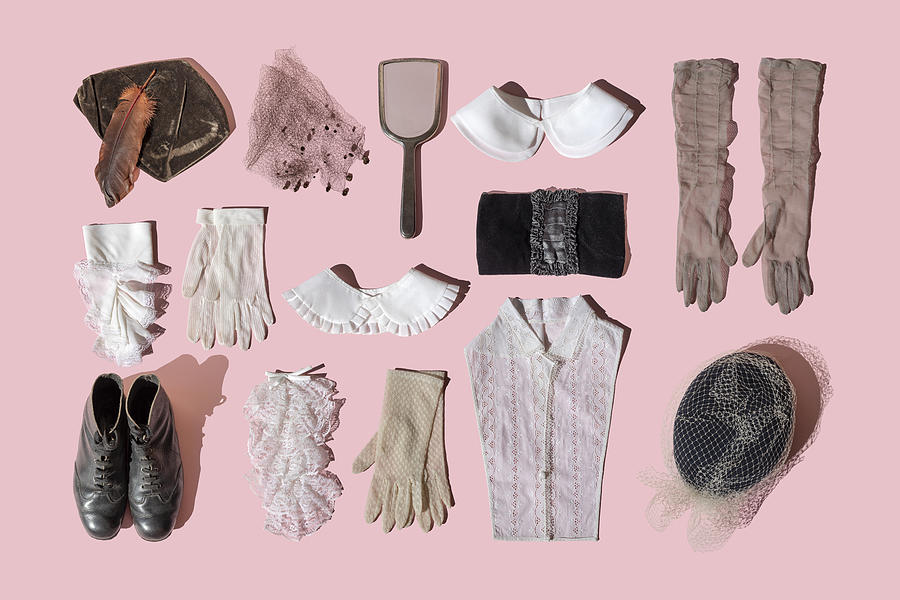 Vintage womens clothing and accessoires on the pink background #1 Photograph by Yulia Reznikov