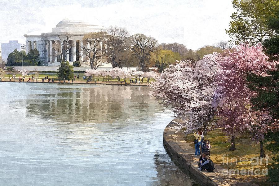Visitors walk around the Tidal Basin cherry blossoms in Washington DC USA #2 Photograph by William Kuta