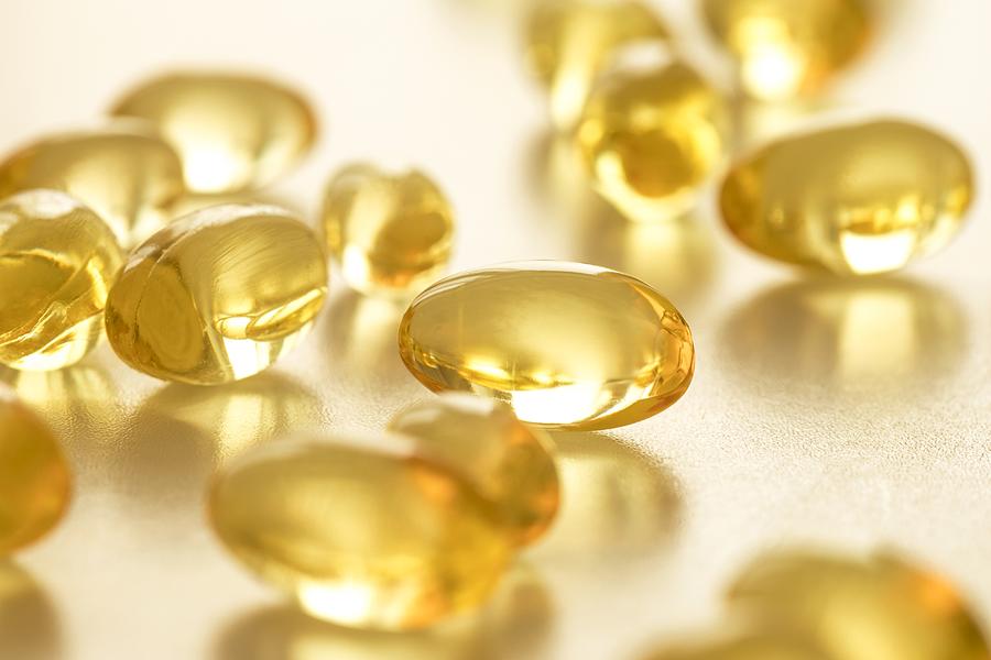 Vitamin D capsules #1 Photograph by Science Photo Library