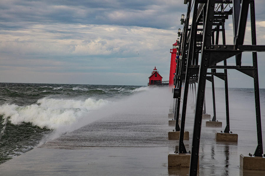 Waves crashing on Grand Haven Pier in Michigan #1 Photograph by Eldon McGraw