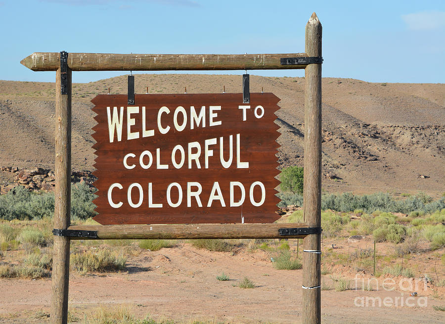 Welcome to Colorful Colorado boarder sign Photograph by Norm Lane