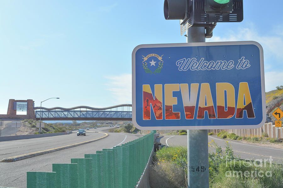 to Nevada Sign on the border with Arizona. In Laughlin, Clark