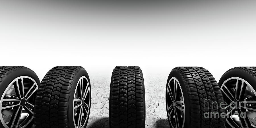 Wheels with modern alu rims on white background #1 Photograph by Michal Bednarek