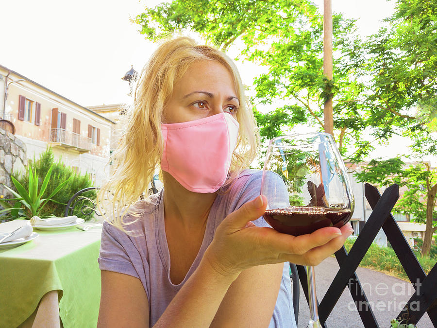 Wine shop with surgical mask in Elba #1 Photograph by Benny Marty