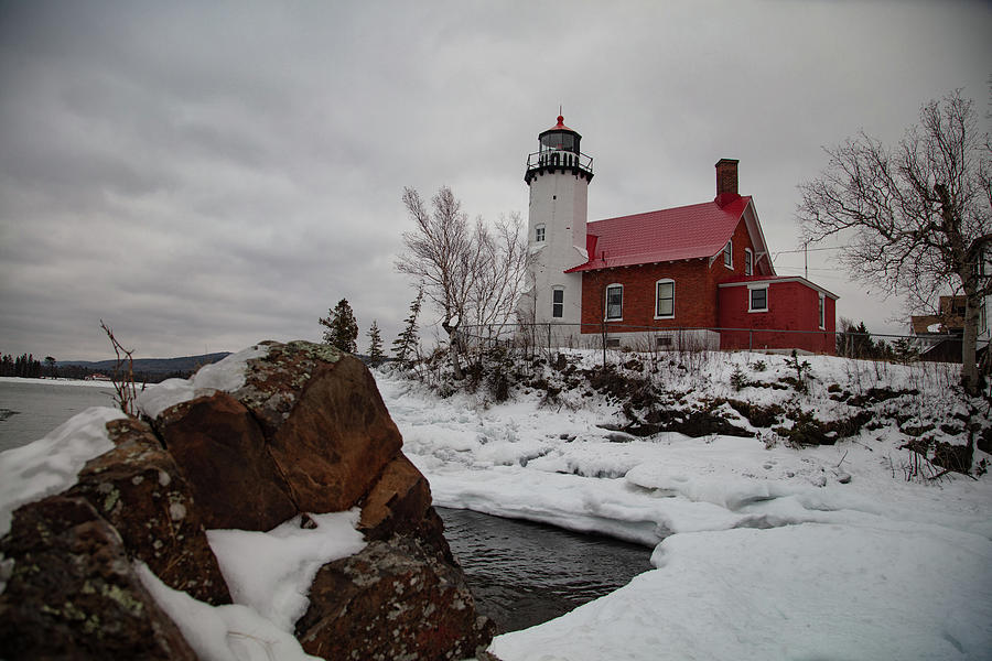 Winter view of Eagle Harbor Lighthouse in Eagle Harbor Michigan #1 Photograph by Eldon McGraw