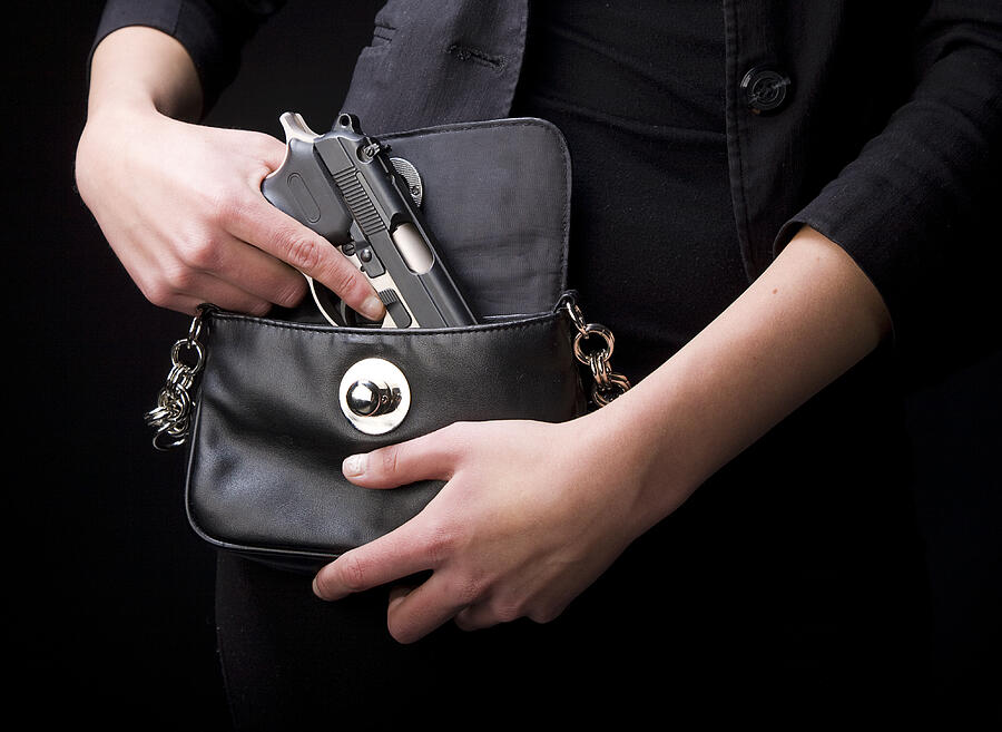 Woman Carrying Handgun #1 Photograph by RichLegg