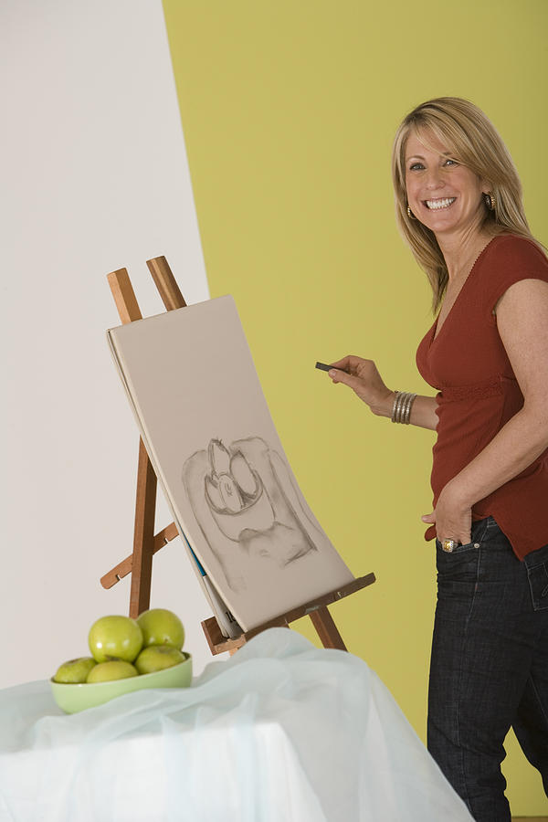 Woman drawing a picture #1 Photograph by Comstock Images