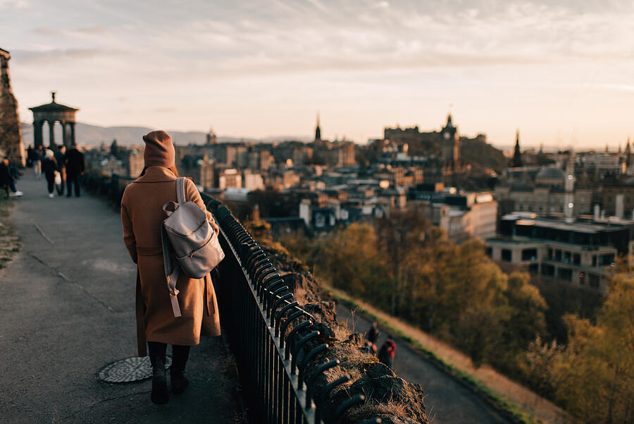 Woman enjoying view from Calton Hill, Edinburgh, Scotland #1 Photograph by Sara Monika