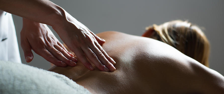 Woman getting back massage #1 Photograph by Slavica