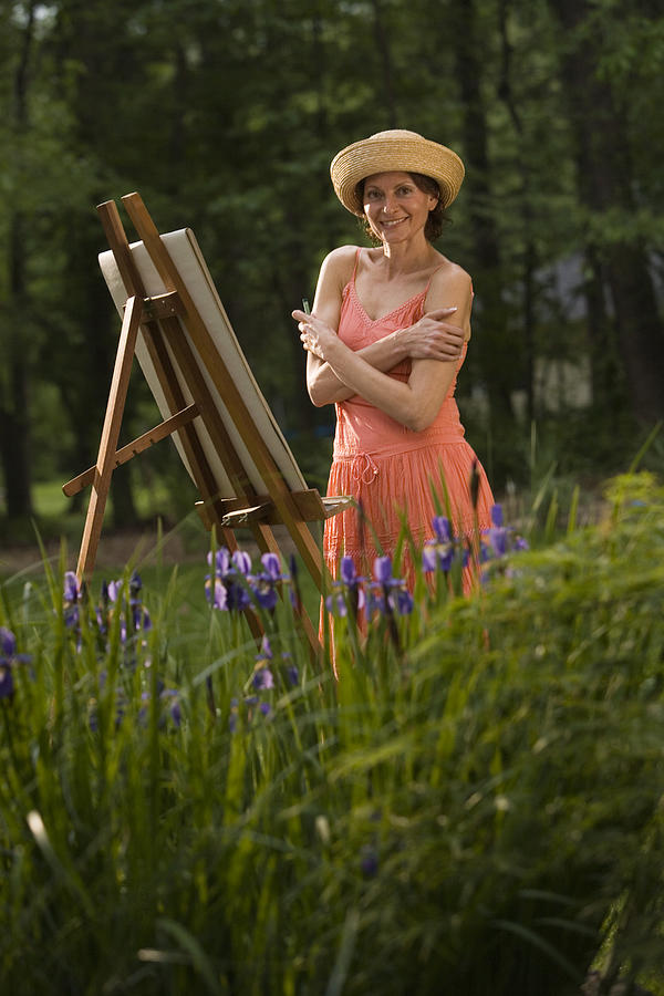 Woman painting outdoors #1 Photograph by Comstock Images
