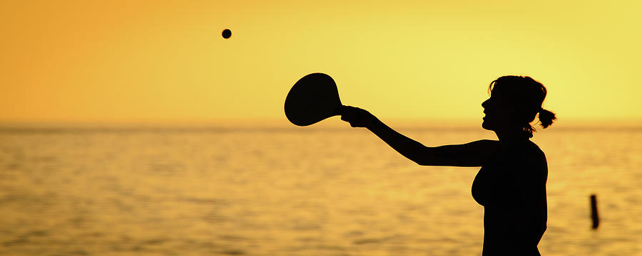 Woman Playing Paddle Ball On The Beach 1 Photograph By Celso Diniz