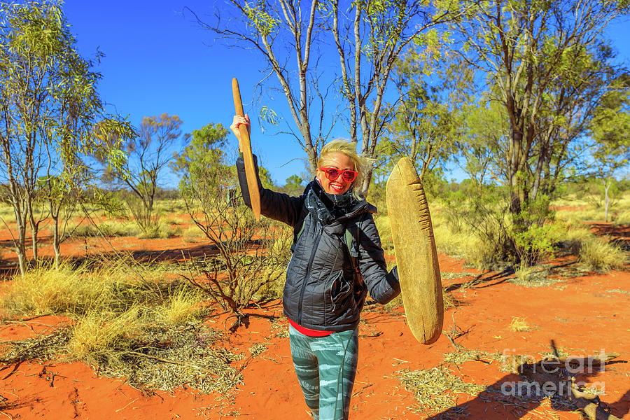 Woman with aboriginal weapons #1 Photograph by Benny Marty