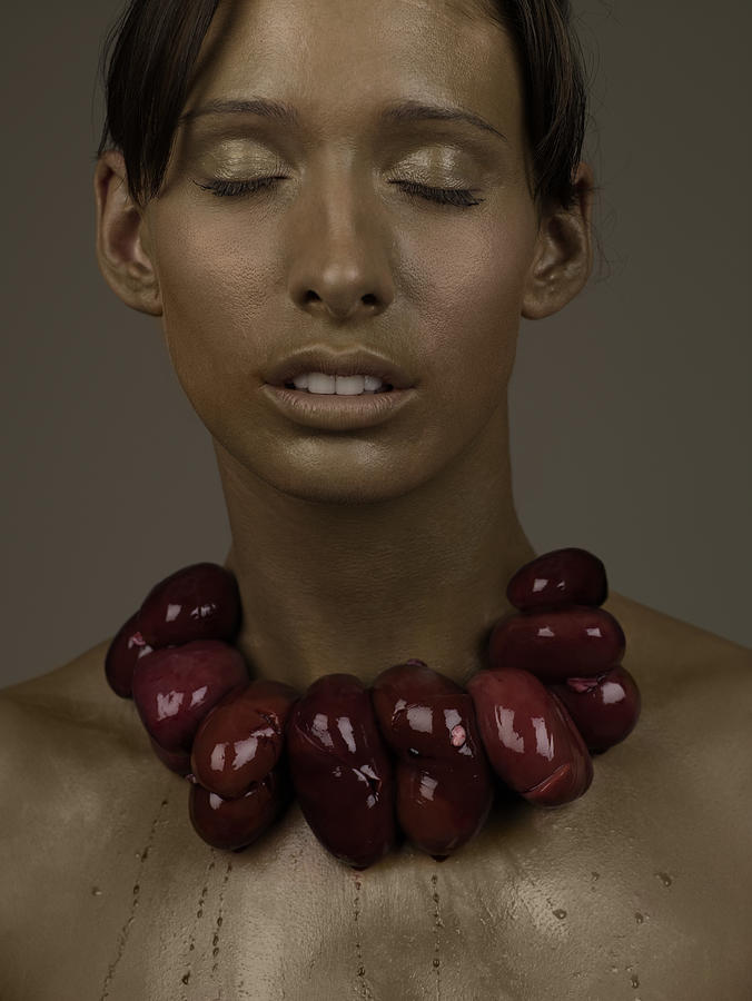 Woman With Meat Necklace #1 Photograph by Patrick Ryan