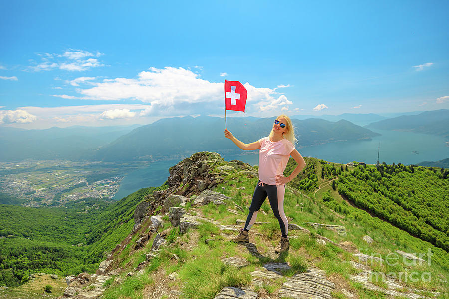 Woman with Swiss flag on Cardada mount #1 Digital Art by Benny Marty