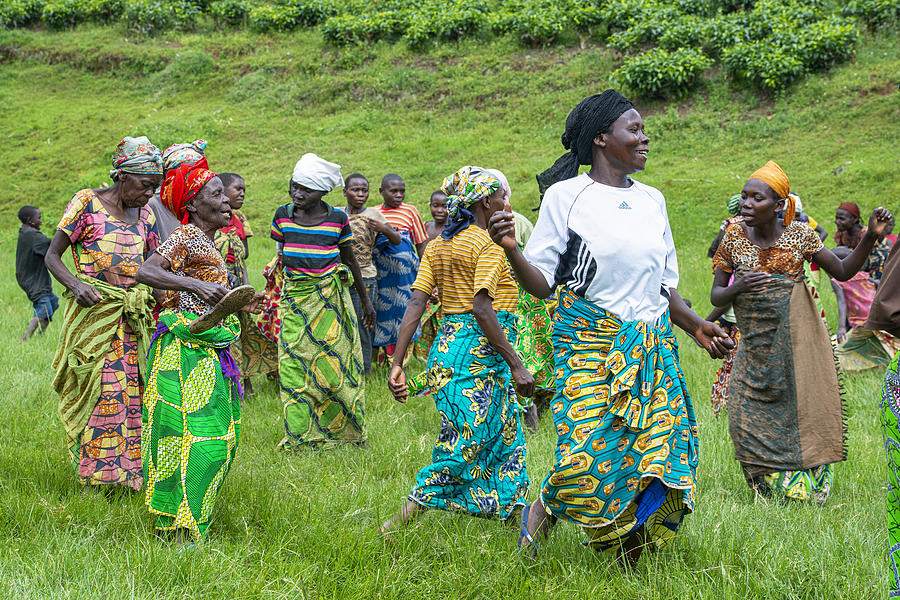Women of the Batwa (Twa) Pygmy people are dancing #1 Photograph by Guenterguni