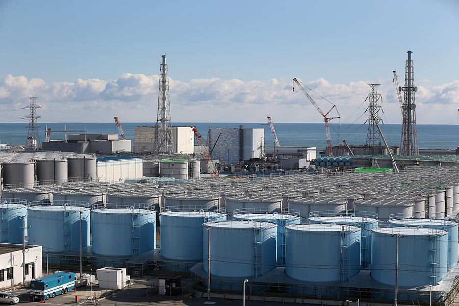 Workers of Fukushima Daiichi Photograph by Christopher Furlong Workers of Fukushima Daiichi Photograph by Christopher Furlong