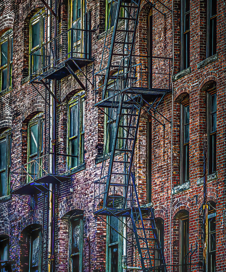 Wrought Iron Fire Escapes in Brick Alley #1 Photograph by Darryl Brooks