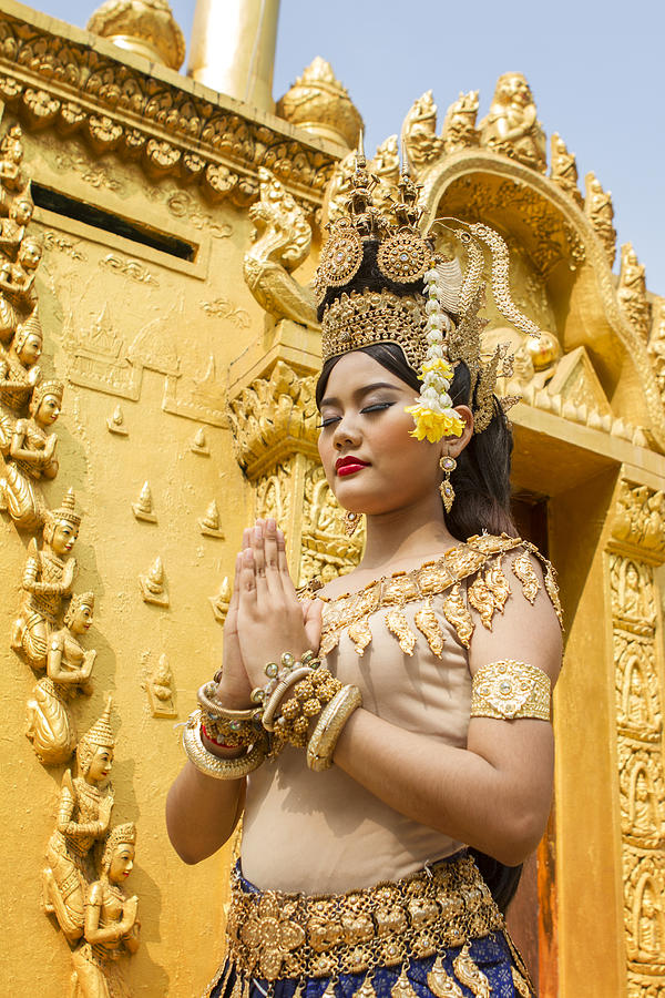 Young Asian female Apsara dancer praying #1 Photograph by Joakimbkk