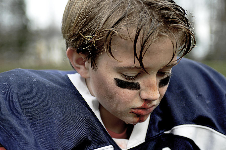 Young Boy Youth Football Injury #1 Photograph by Chris Minihane