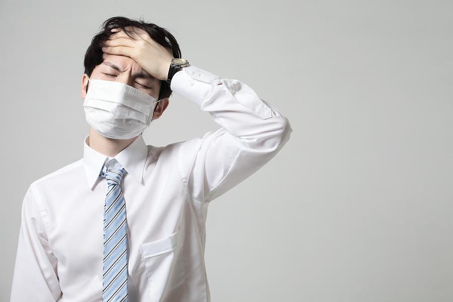 Young Businessman With A Mask,bad Condition #1 Photograph by Runstudio