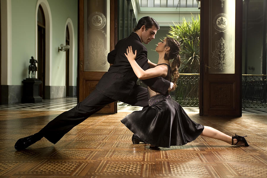 Young couple tango dancing  #1 Photograph by Hans Neleman