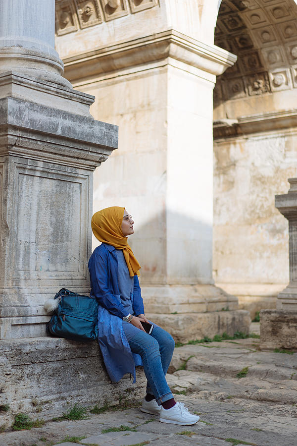 Young muslim woman traveller in Kaleici (old town of Antalya) #1 Photograph by Hsyncoban