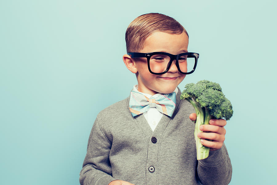Young Nerd Boy Loves Eating Vegetables #1 Photograph by RichVintage