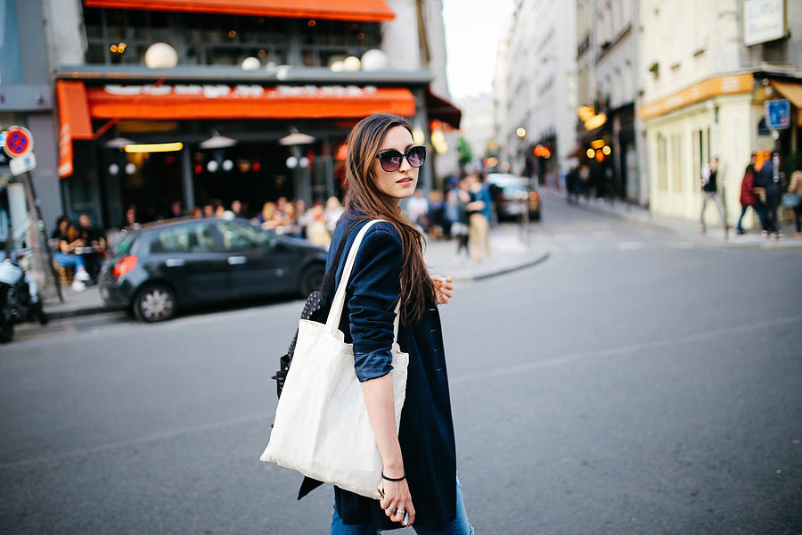 Young tourist woman walking in Paris #1 Photograph by Lechatnoir