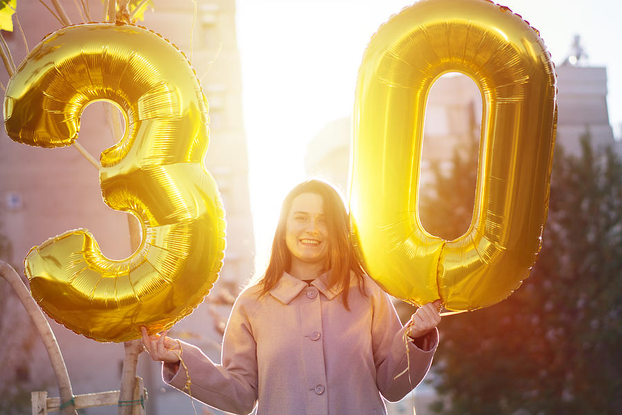 Young woman celebrates a thirty years birthday #1 Photograph by Burak Karademir