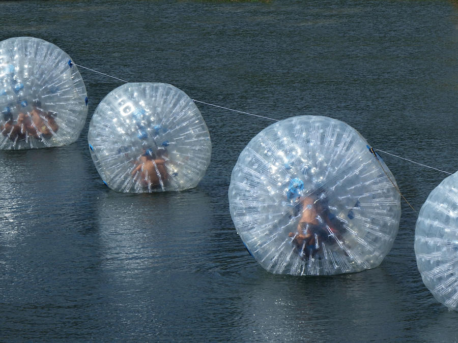 Zorbing on water #1 Photograph by Japatino