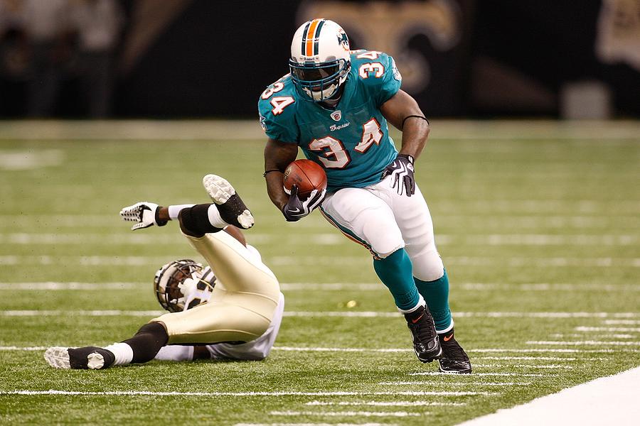 Miami Dolphins v New Orleans Saints #10 Photograph by Chris Graythen
