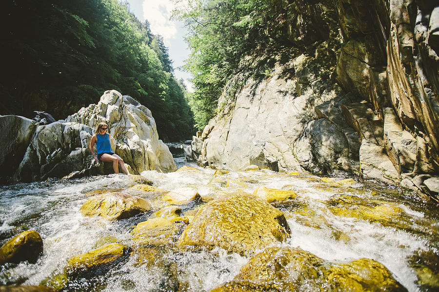 Woman hiking and swimming in Clarendon Gorge, Vermont. USA #10 Photograph by Justin Cash