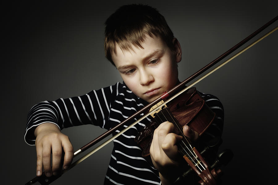10 Year Old Playing The Violine Photograph by Silvia Otte