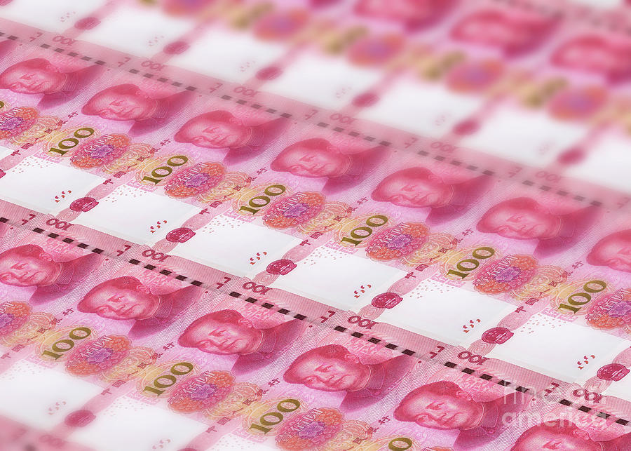100 Chinese Yuan banknotes stack Photograph by Benny Marty